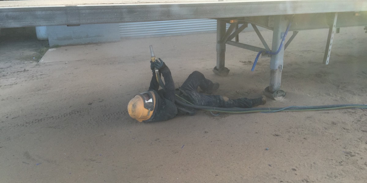 Blasting under 40ft trailer